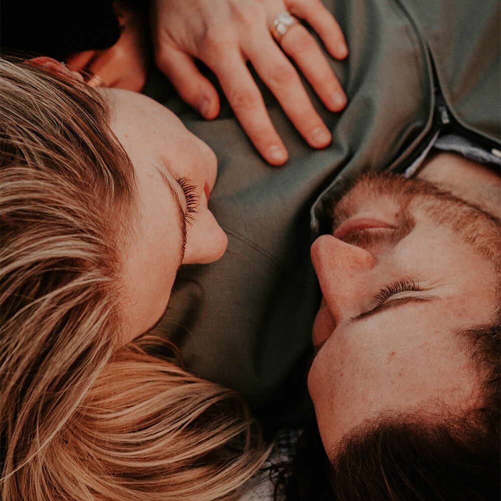 A couple holding each other