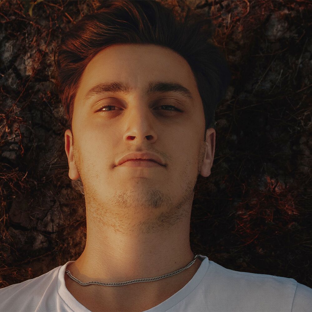 A man resting with eyes closed
